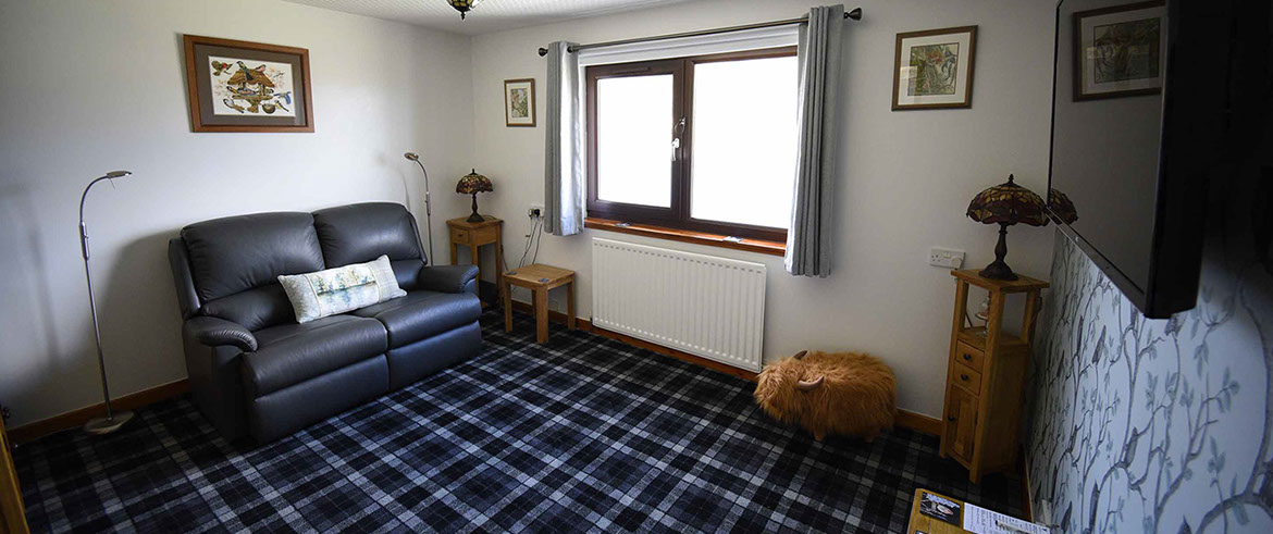 Contact our bed and breakfast accommodation in Sconser on the Isle of Skye with sea views living room widescreen TV and WIFI