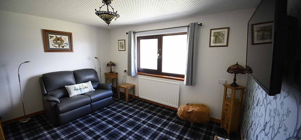 Contact our bed and breakfast accommodation in Sconser on the Isle of Skye with sea views living room widescreen TV and WIFI